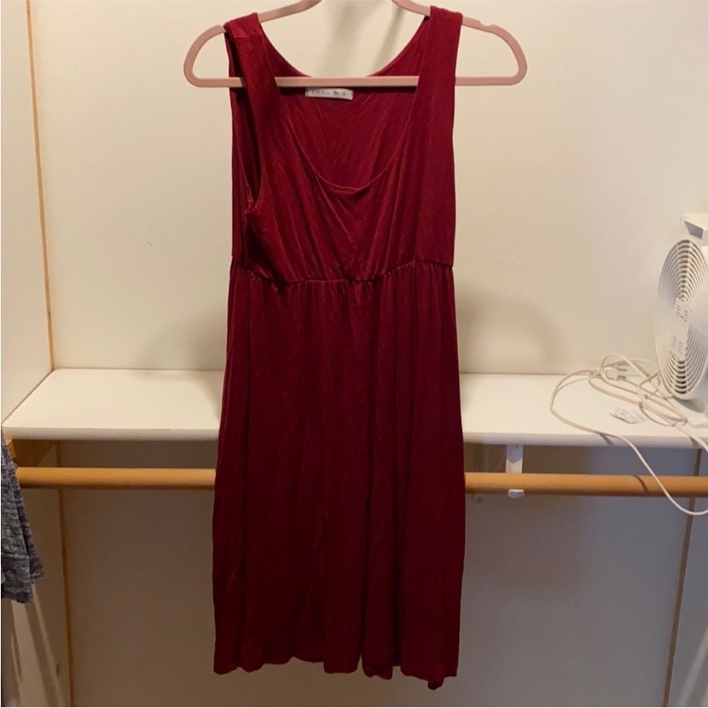 Sleeveless, soft, burgundy knee length dress from CA boutique